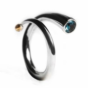 Spiral wiggle ring with blue topaz and 18ct yellow gold ball